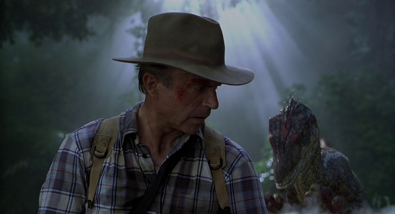 Velociraptor sneaks up on Alan Grant in Jurassic Park 3