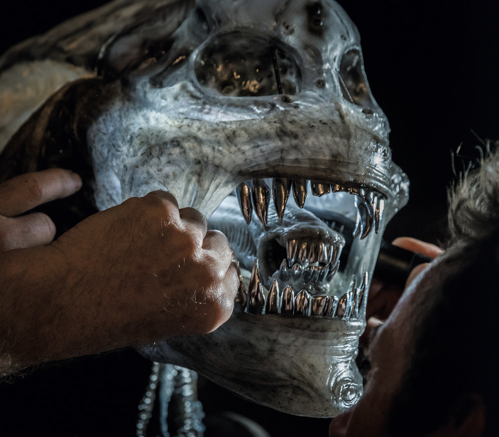 Making adjustments to the Alien on set